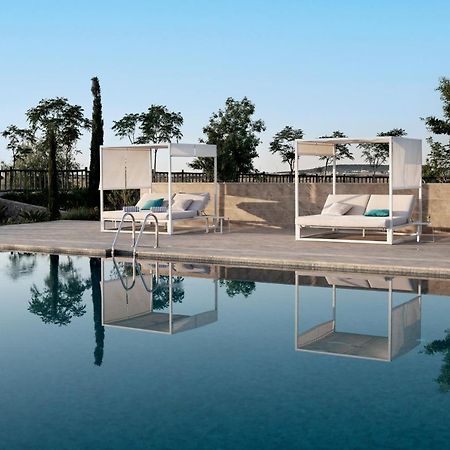 Hospes Palacio De Arenales & Spa Cáceres Exterior photo 3D rendering of a poolside scene